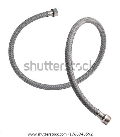 Flexible connection hose. Plumbing hose in nylon polymer braid. Isolated on a white background. Royalty-Free Stock Photo #1768945592