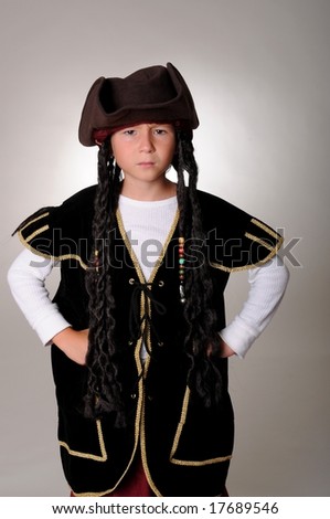 Young boy wearing a pirate's costume