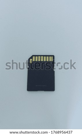 The back of an sd card on a beautiful background 