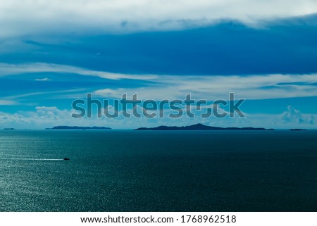 calm ocean blue sky island south east asia