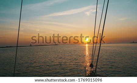 Reflected sun on a water surface. Sunset over sea. Summer Seascape, Trave, Vacation concept