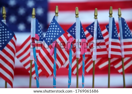 4th of July. American Flags with American Flag Background. America's Independence Day is the day to Celebrate our heritage and Independence from British Rule. Happy 4th of July.  