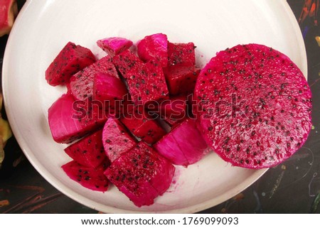 dragon fruit slices on a plate