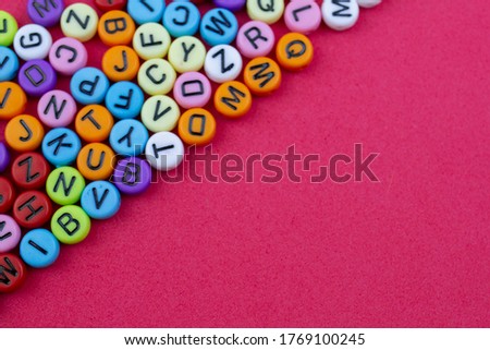 Different letters on the coloured background