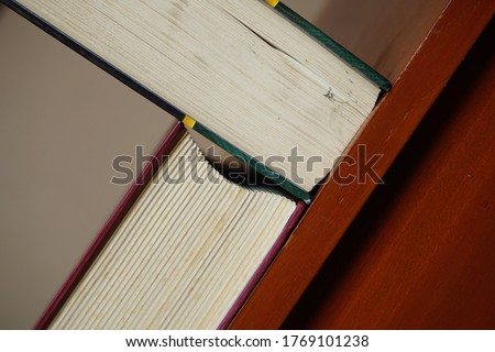 Thick book texture against background blur and bokeh