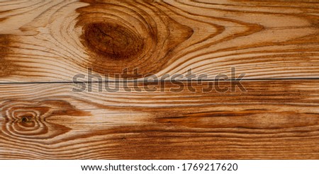 Wood texture background. Light brown surface of old knotted wood with natural color, texture and pattern.