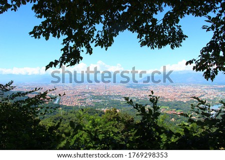 photography of turin seen from the hill where the superga basilica is located
Turin from above