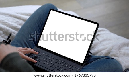 using digital touchscreen tablet with stylus pen and smart keyboard