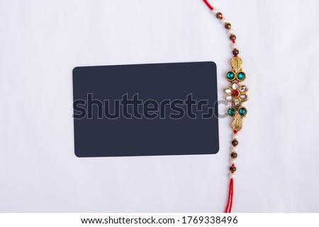 Close up portrait isolated rakhi and credit/debit card with white background