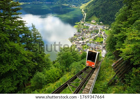 A cable car taking visitors up to Salzwelten, Hallstatt, Austria; one of the oldest salt mines in the world. Royalty-Free Stock Photo #1769347664