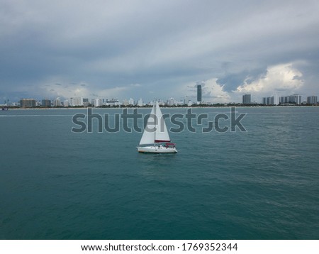 Sail Boat with Miami Beach Skyline on the horizon