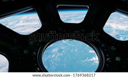 View from Cockpit International Space Station through porthole nearby of planet Earth. Concept of exploration and research, rocket launching. Composed by NASA images.