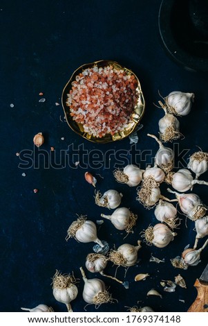 
garlic on dark ground, food photography