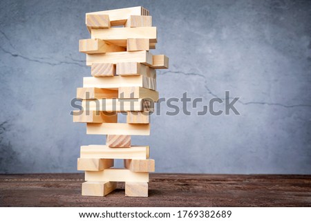  one tower of wooden blocks. business concept Royalty-Free Stock Photo #1769382689