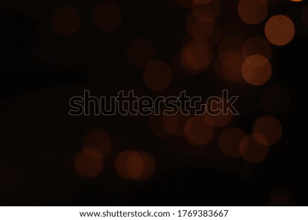 Gold abstract bokeh background, Festive xmas abstract background with bokeh defocused lights and stars
