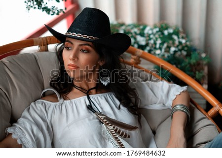 Beautiful smiling young south girl boho style clothing and jewelry