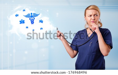Beautiful young doctor with abstract cloud and medical icons