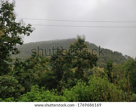 View of the mountain covered by fog at Mount Abu in Rajasthan, India
