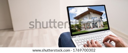Online House And Real Estate Property Search On Laptop