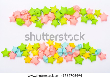 Stripes in a children's style lined with multi-colored paper stars. For use as a text separator or as a design element in layout or scrapbooking