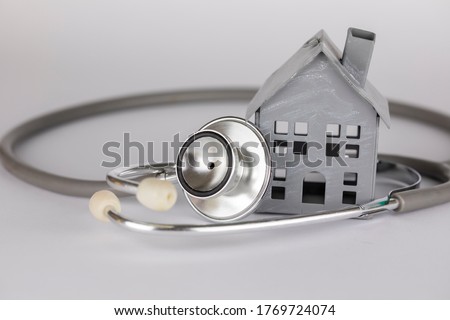 House and stethoscope, Health and care Concept
