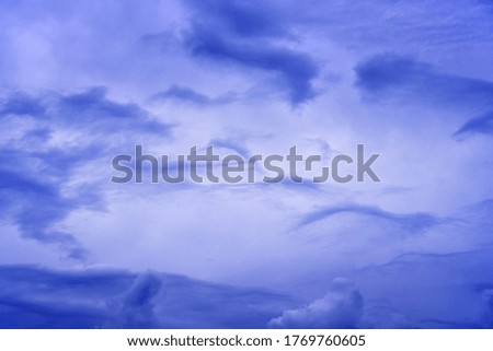A monotone sky with turbulent clouds.