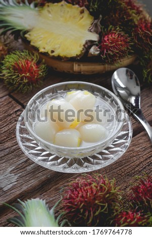 Rambutan stuffed with pineapple in syrup.