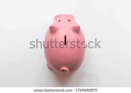 High angle view of a piggy bank isolated on white