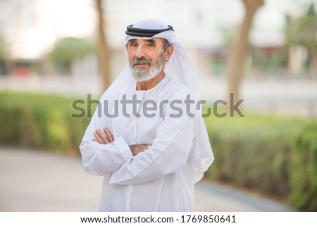 Arabian senior man with traditional white kandura portrait Royalty-Free Stock Photo #1769850641