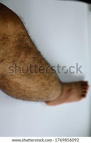 Closeup of hairy Japanese male legs