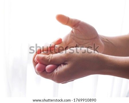 Asian women with finger pain, hand pain and numbness.