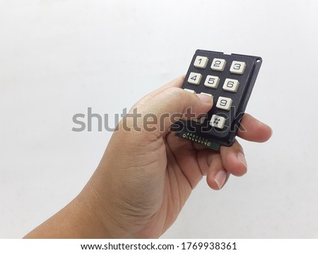 Electronic Keypad in White Isolated Background