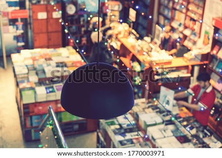 blurred abstract background of book on bookstore. blurry bookshelf in library room for your background. The concept of self-education. toned