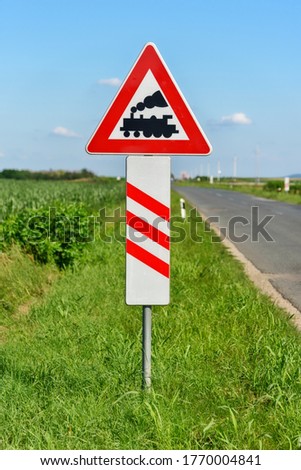 Train passage sign. Railroad crossing signs