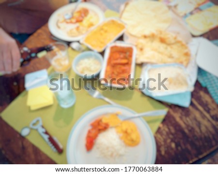 Blurry picture of a takeaway meal