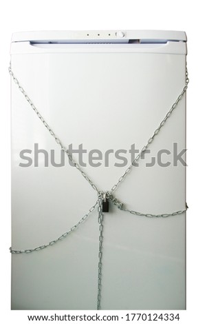 refrigerator wrapped in a metal chain and closed with a padlock on a white background. overeating concept, diet, healthy lifestyle.
