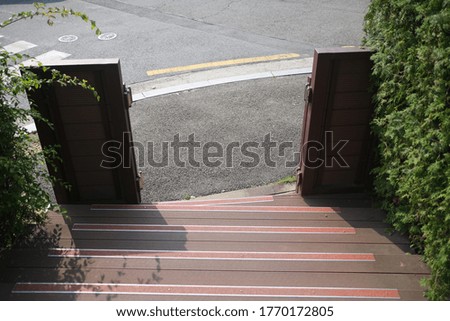 a combination of wooden stairs and landscapes