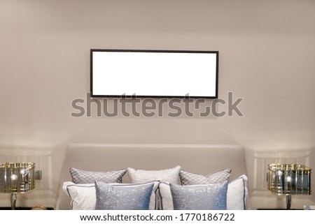 blank frame on the wall in gallery