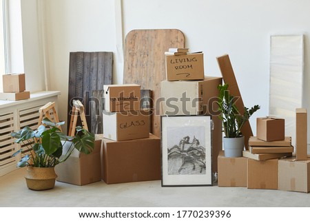 Image of packed signed boxes and other things prepared for relocation