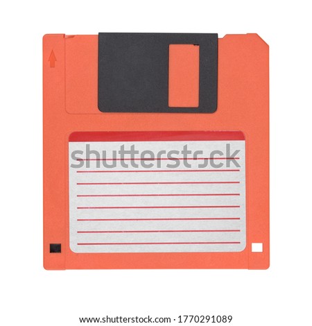 Red 3.5-inch floppy disk or diskette isolated on white background