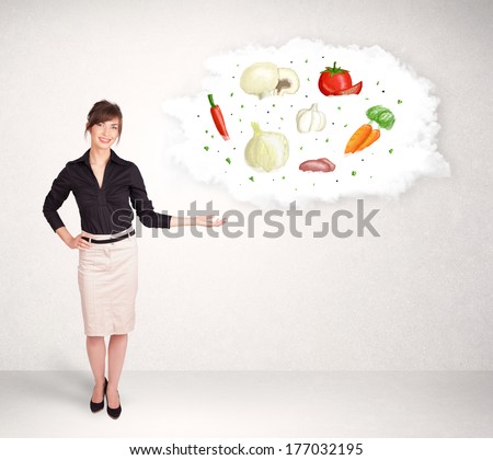 Young girl presenting nutritional cloud with vegetables concept
