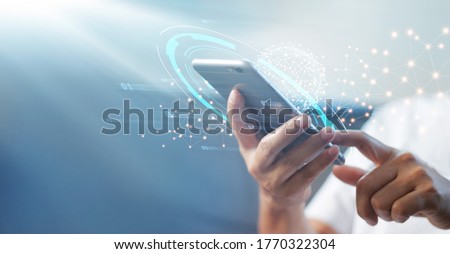 Man using mobile smart phone with global network connection, Technology, innovative and communication concept. Royalty-Free Stock Photo #1770322304