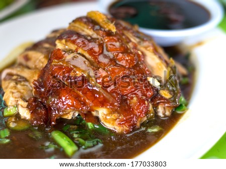 Roasted duck with sauce in the plate, Chinese food