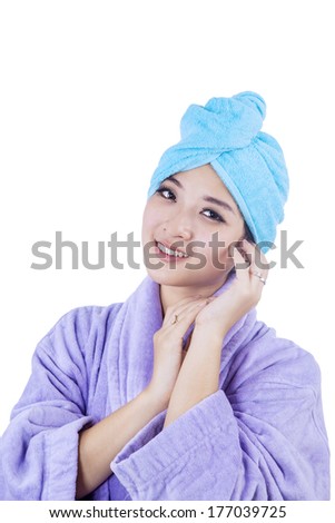 Beautiful woman with towel isolated on white background