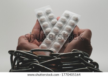 Person addicted to Prescription Medications. There is no choice but to take expensive medicine.  Royalty-Free Stock Photo #1770405164