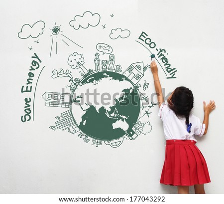 Girl holding a paint brush painting on a white wall with creative drawing eco friendly, save energy