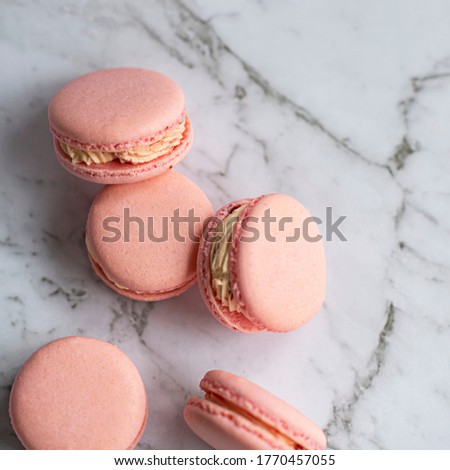 Macaroon macaroons on white marble flatlay flat lay product shot assorted colours colors flavours flavors dessert snack sweets french macaroons 