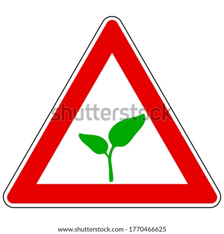 Plant and attention sign on white
