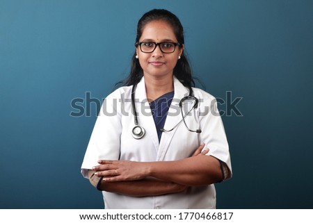Portrait of a young female doctor of Indian origin Royalty-Free Stock Photo #1770466817