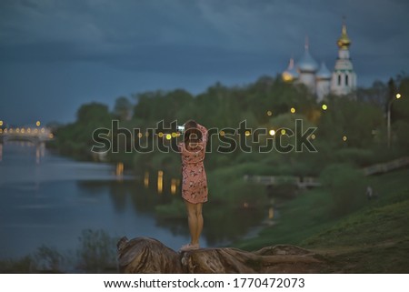woman smartphone landscape evening view, river landscape shooting photo on the phone at night